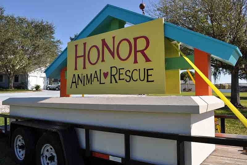 Workers from Florida Sign Co. today are busy erecting a new monument sign for Honor Animal Rescue at its Lorraine Road ranch.