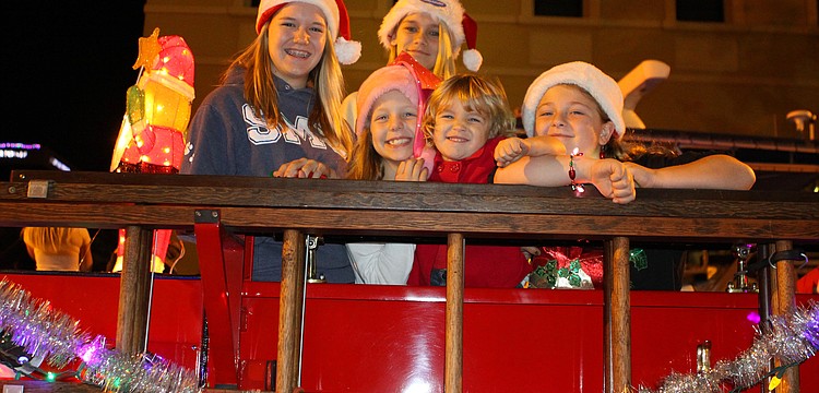 Lilly Savary, Abbi Wilkinson, Kelsey Fisher, Kylee Wilkinson and Baylee Stepina were all on the fire engine as part of the fire departmentâ€™s float.