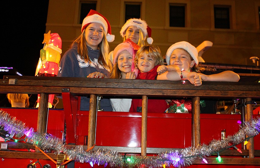 Lilly Savary, Abbi Wilkinson, Kelsey Fisher, Kylee Wilkinson and Baylee Stepina were all on the fire engine as part of the fire departmentâ€™s float.