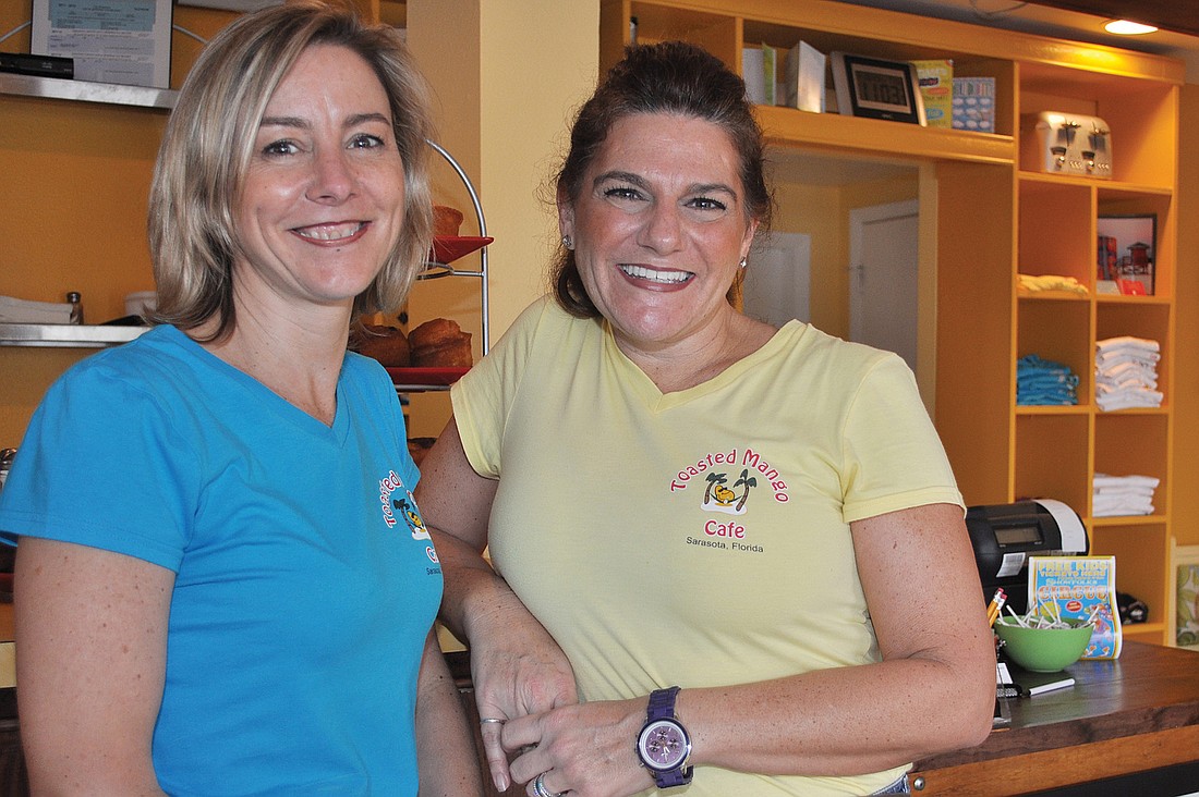 Toasted Mango CafÃƒÂ© owners Kimberly Duffy and Sandi Wagner