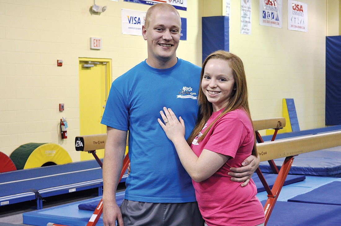 Russell Bolingbroke and his fiancee, Lauren Flenniken, are gymnastics instructors at Kids Supergym in Lakewood Ranch.