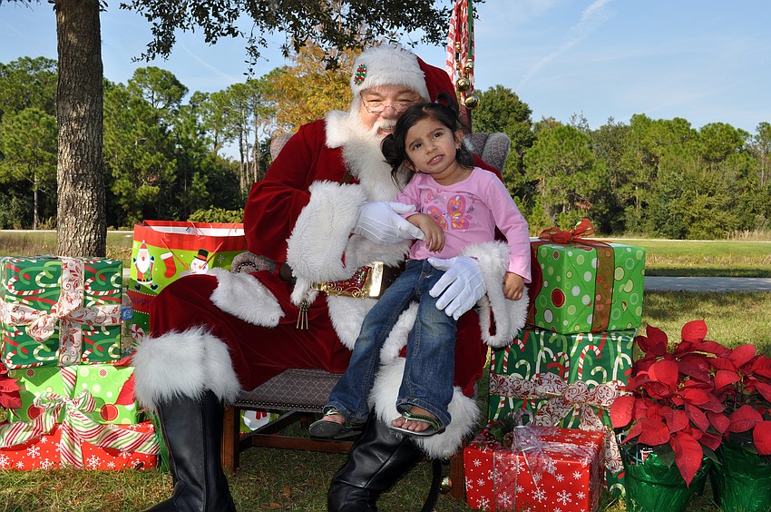 Two-year-old Natasha Caro couldnâ€™t wait to meet Santa Claus and ask him for something purple.