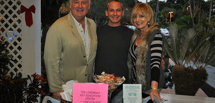 Tom Aposporos with the Longboat Key, Lido Key, St. Armands Key Chamber of Commerce, new chamber member Stan Umenhofer and Susan Goldfarb with the Longboat Key Education Center