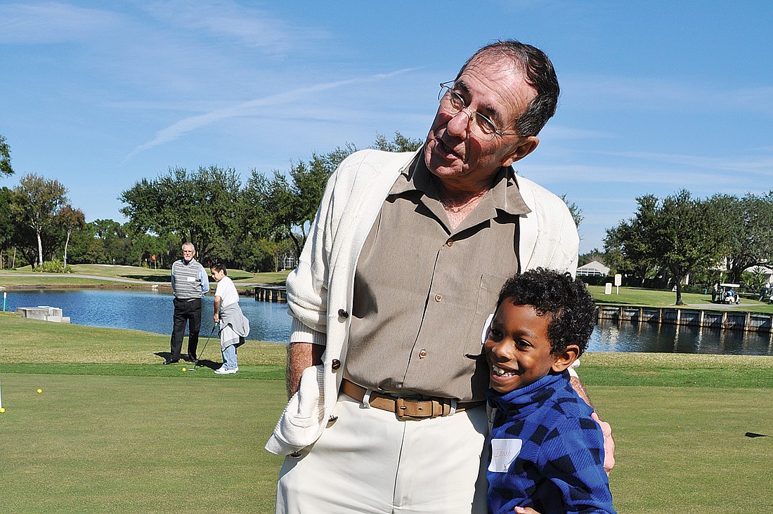 Rosedale resident Jack Sodini and his student, Isaiah Depina, had a blast on the golf course together.