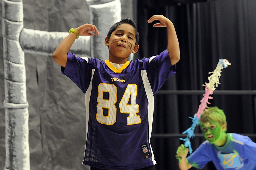 An exasperated 10-year-old Miguel Rodriguez tried to explain how he wasnâ€™t a piÃ±ata, as alien Matt Gelorme, 10, chased him across the stage.