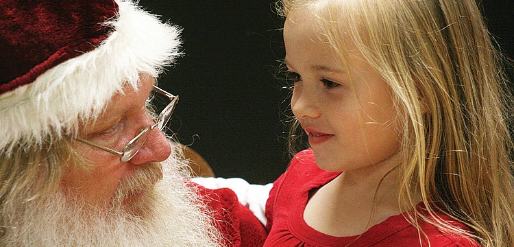 Lauren Costello, 6, made sure to tell Santa what she wanted for Christmas during Tara Elementary Schoolâ€™s Dinner with Santa Dec. 2. Published Dec. 8, 2011.
