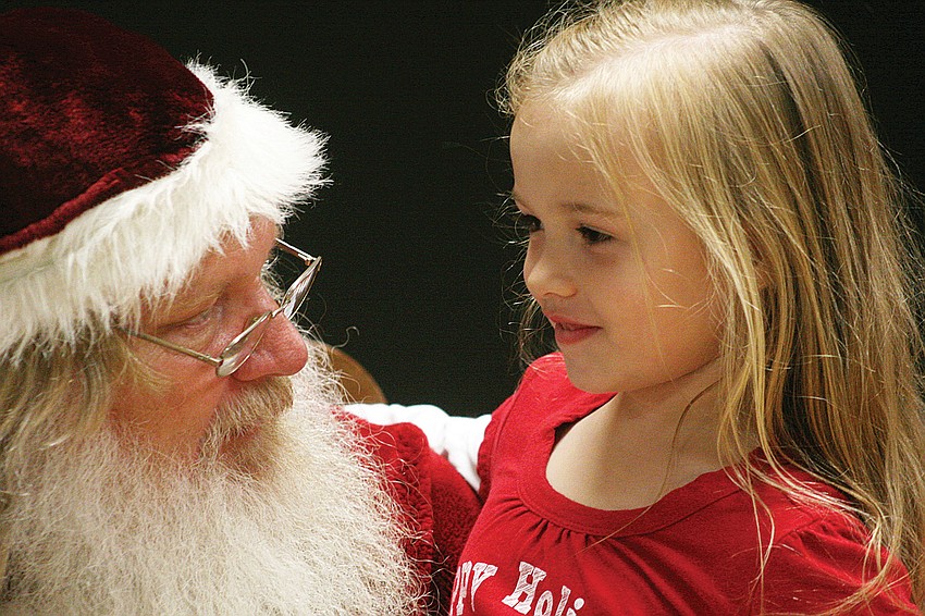 Lauren Costello, 6, made sure to tell Santa what she wanted for Christmas during Tara Elementary Schoolâ€™s Dinner with Santa Dec. 2. Published Dec. 8, 2011.