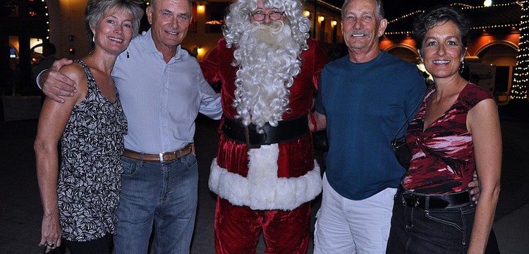 Winestylesâ€™ Ruth and Jack Jimmink and Bucky and Kathy Jones enjoyed a visit from Santa Claus.