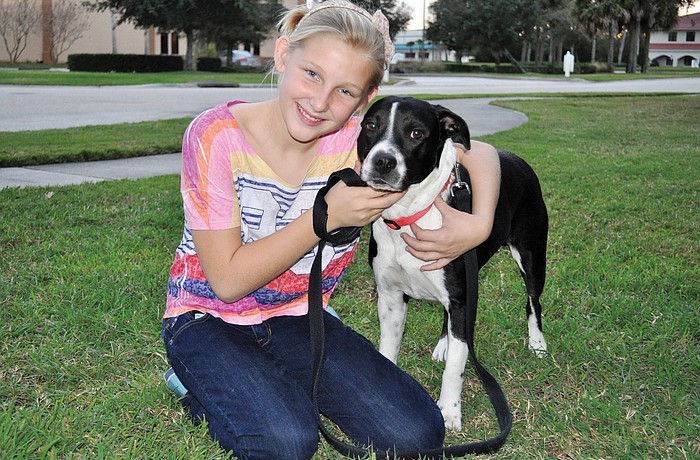 Sydney Ashley and her family adopted their dog, Ky-Man, from the Sarasota County Humane Society. Photo by Jen Blanco.