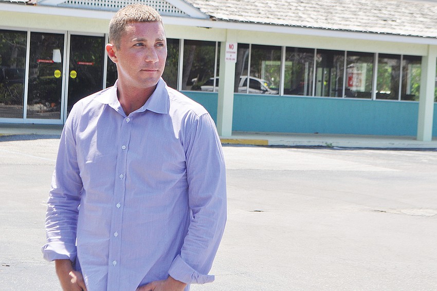 In April, developer Brian Kenney, with Juliani Kenney Investment Capital LLC, stood in front of Whitney Beach Plaza, which was 85% vacant at the time.