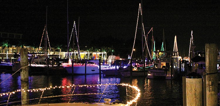 The boats docked at Sarasota Yacht Club were awash in a rainbow of colors during the "Lighting of the Fleet" ceremony in December.