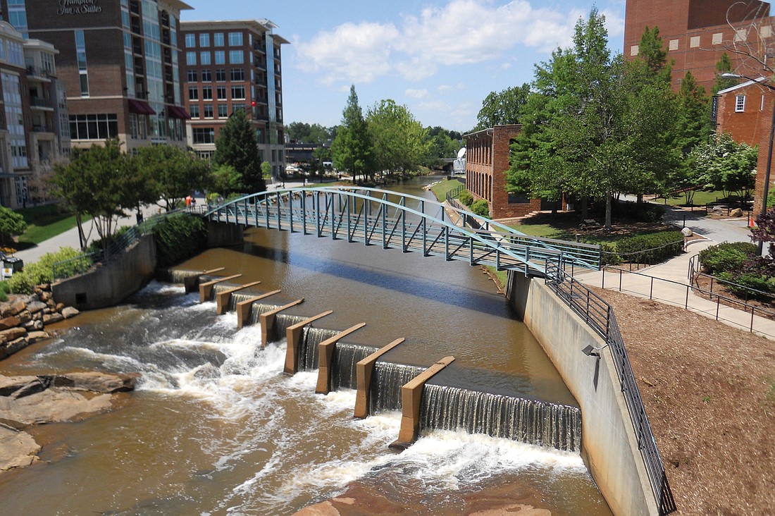 One of the city of Greenville, S.C.Ã¢â‚¬â„¢s most controversial moves involved buying lots behind the Reedy River for mixed-use developments. Photo courtesy of Greater Sarasota Chamber of Commerce.