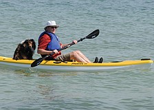 Barry Sullivan takes a trip on his new kayak with his dog, Justice.