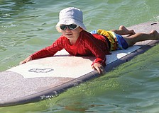 Harrison Troyan, 4, was among about 80 youngsters who participated Sept. 17 in the Hang Ten for Autism event on the public beach.