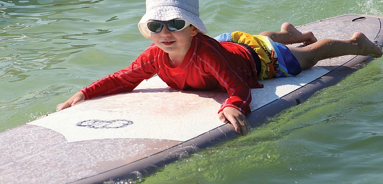 Harrison Troyan, 4, was among about 80 youngsters who participated Sept. 17 in the Hang Ten for Autism event on the public beach.