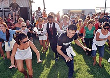 The members of the flash mob performed during a break between sets in August at First Friday Fest.