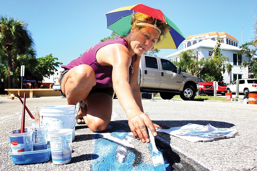 Marion Ruthardt, from Duisburg, Germany, worked on her piece, 