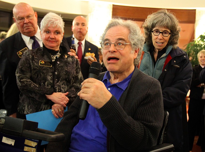 Itzhak Perlman speaks to the Rotarians, Tuesday, Jan. 3, inside the USF Sarasota-Manatee FCCI Rotunda.