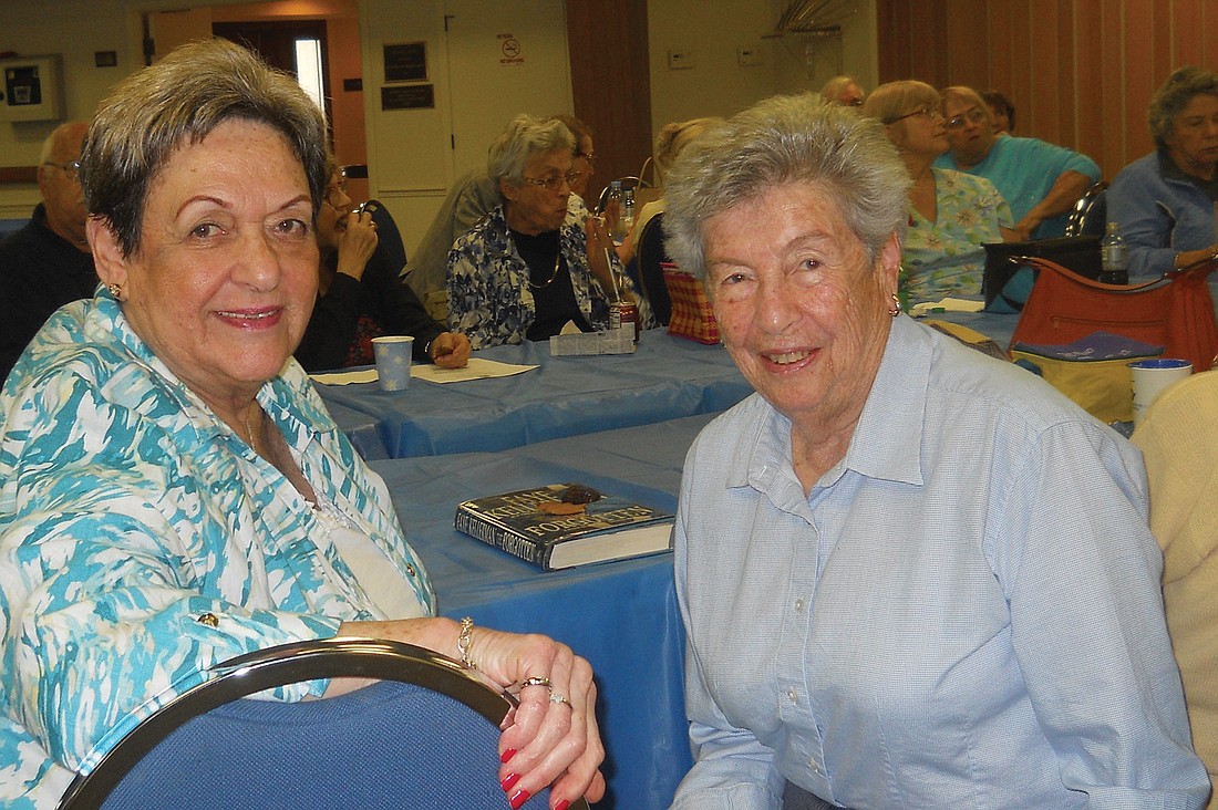 Pelican Cove resident Margie Rosenthal socializes with Mim Sabshin at Temple Emanu-ElÃ¢â‚¬â„¢s Lunch with the Rabbi Jan. 4. Courtesy photo.