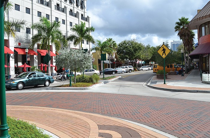 A Main Street streetscape project is being debated among merchants and city officials.