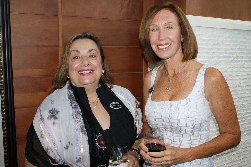 Maddie Kujawski and Marlene Lancaster pose for a photo.