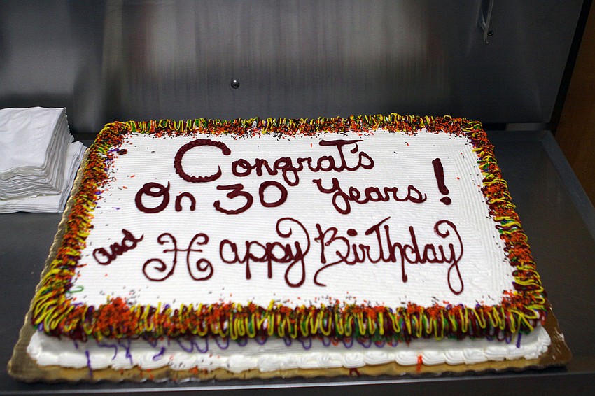 The cake, as well as all the food and beverages, was in an examination room and according to the scale weighed in at almost 13 lbs.