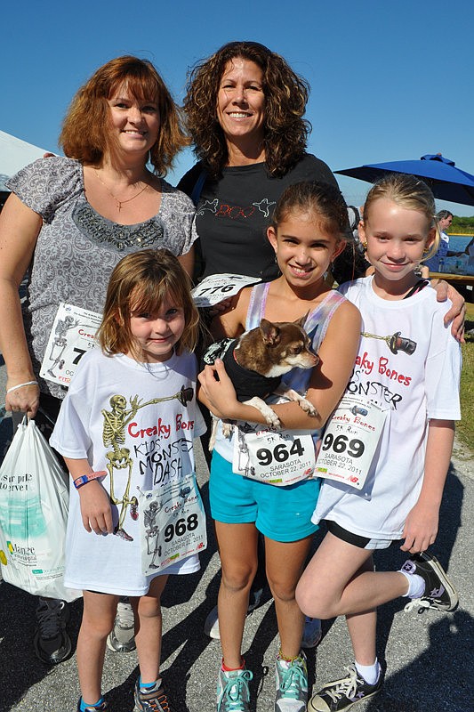 Jill Lowery and Karen Bonnici came out with their children, Sarah Lowery, front left, Katie Bonnici, center, and Allie Lowery, right.