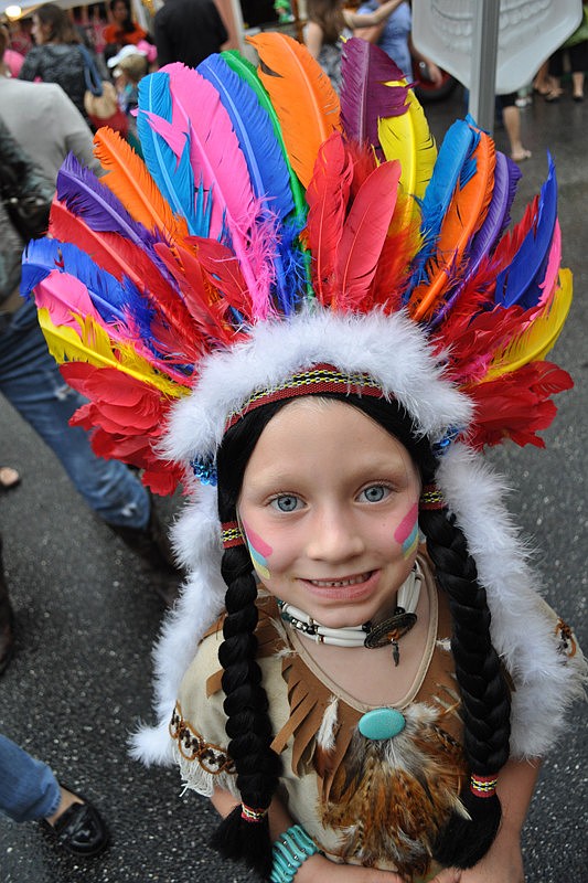 Julia Ryerson, 5, got some help with her costume from her mom.