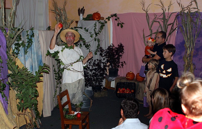 Rainer Dornemann played the â€œOrchard Manâ€ in the fantasy land created by Waldorf Sarasota for their Halloween Fest and Lantern Walk, Sunday, Oct. 30, at Pine Shores Presbyterian.