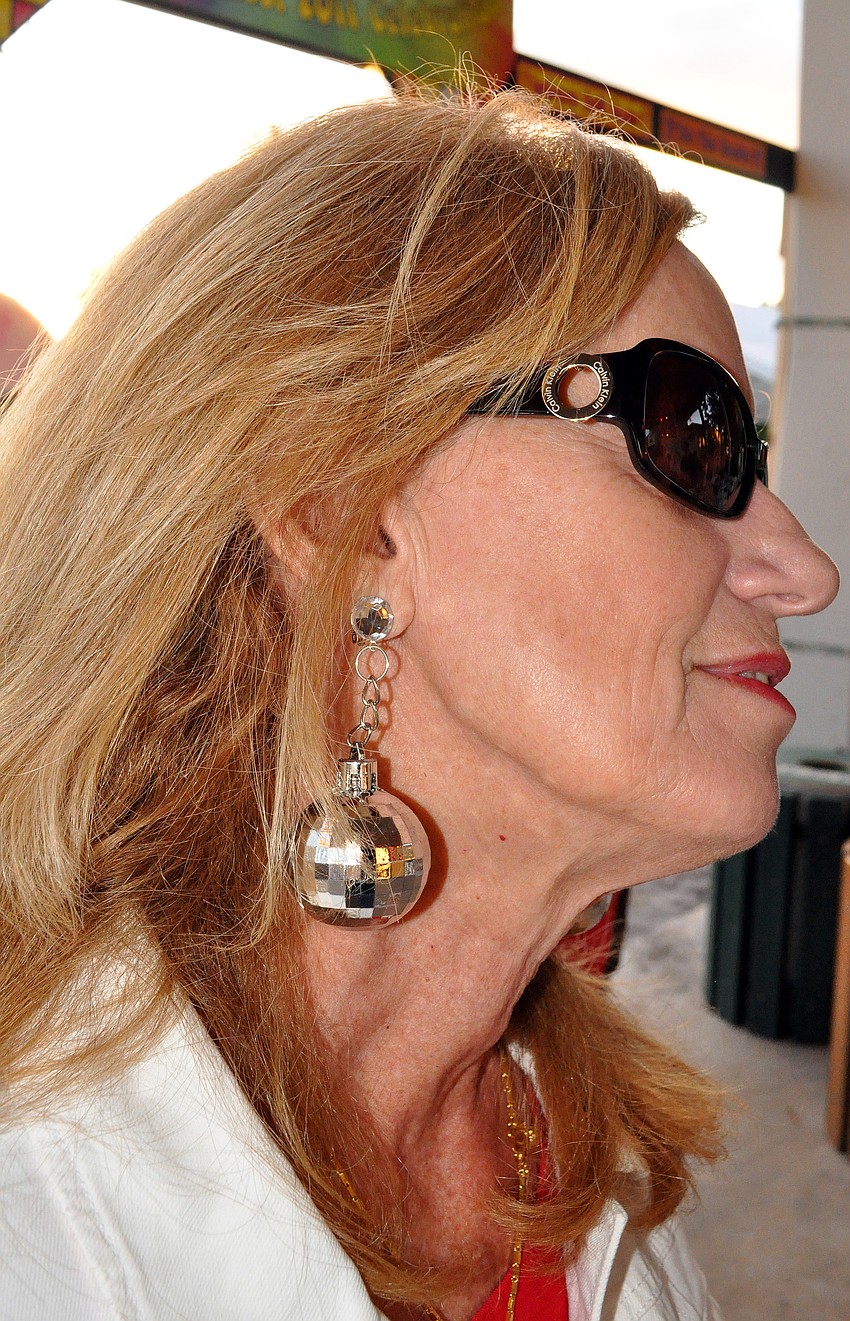 June Howell and her disco ball earrings.