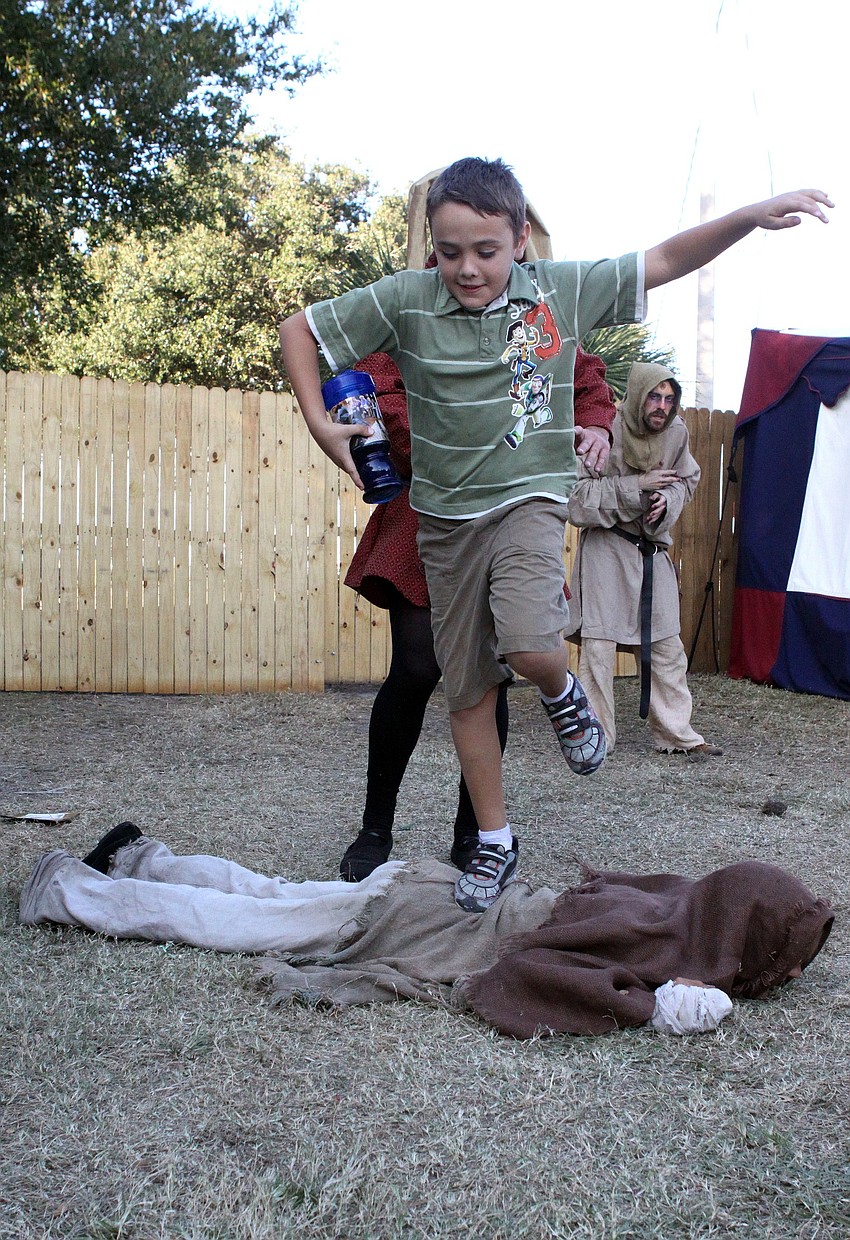 Noah Gucwa, 8, walks over 