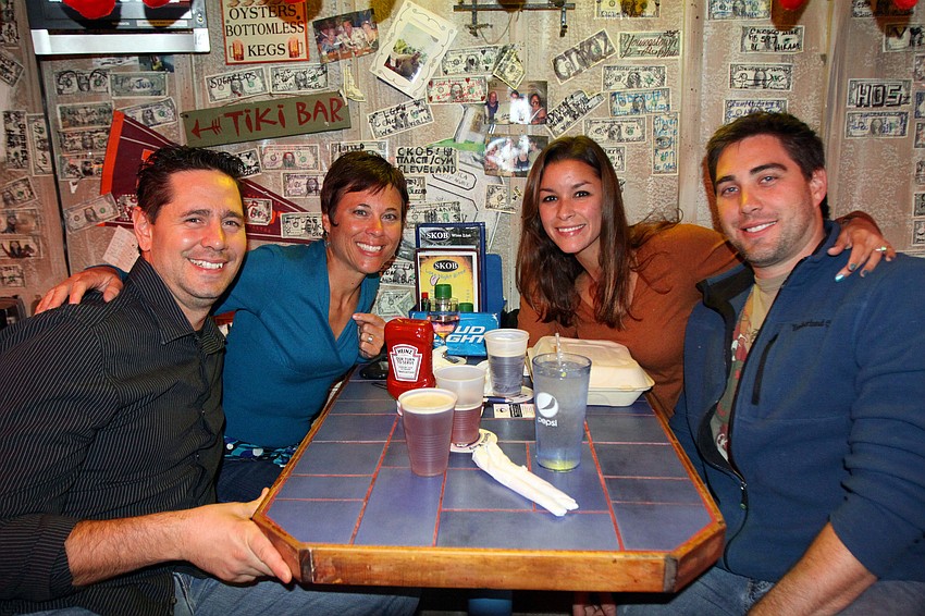Matt and Adrienne Cardwell share a table with Amanda Patino and Blake Foltz