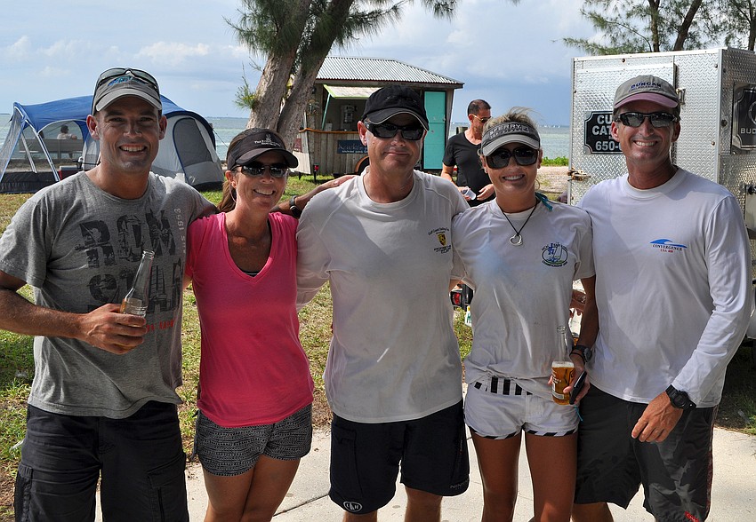 Ben Moon, Katie and Martin Kullman, Whitney Prossner and Steve Leibel pose together after racing in the Melges-24.