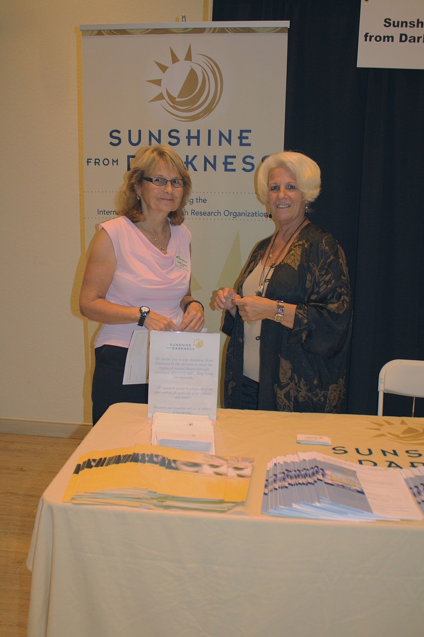 Susan Lomas poses with Phelan-McDermid Syndrome Foundation and Marlene Hauck the Managing director of Sunshine for darkness.