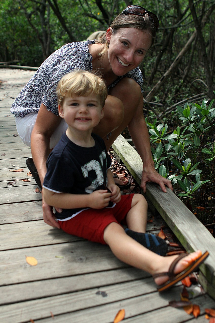 Sarah and Lucas, 2, Raynor have fun together on their mangrove tour.