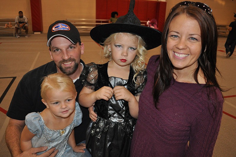 Shaun and Neilee Robeck spent the day with their daughters, Taylor, left, and Chase, center.