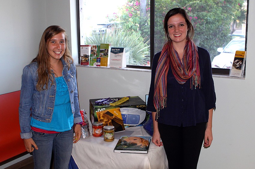 Kylie Griffin and Sarah Johnson were in charge of the raffle tickets and table.