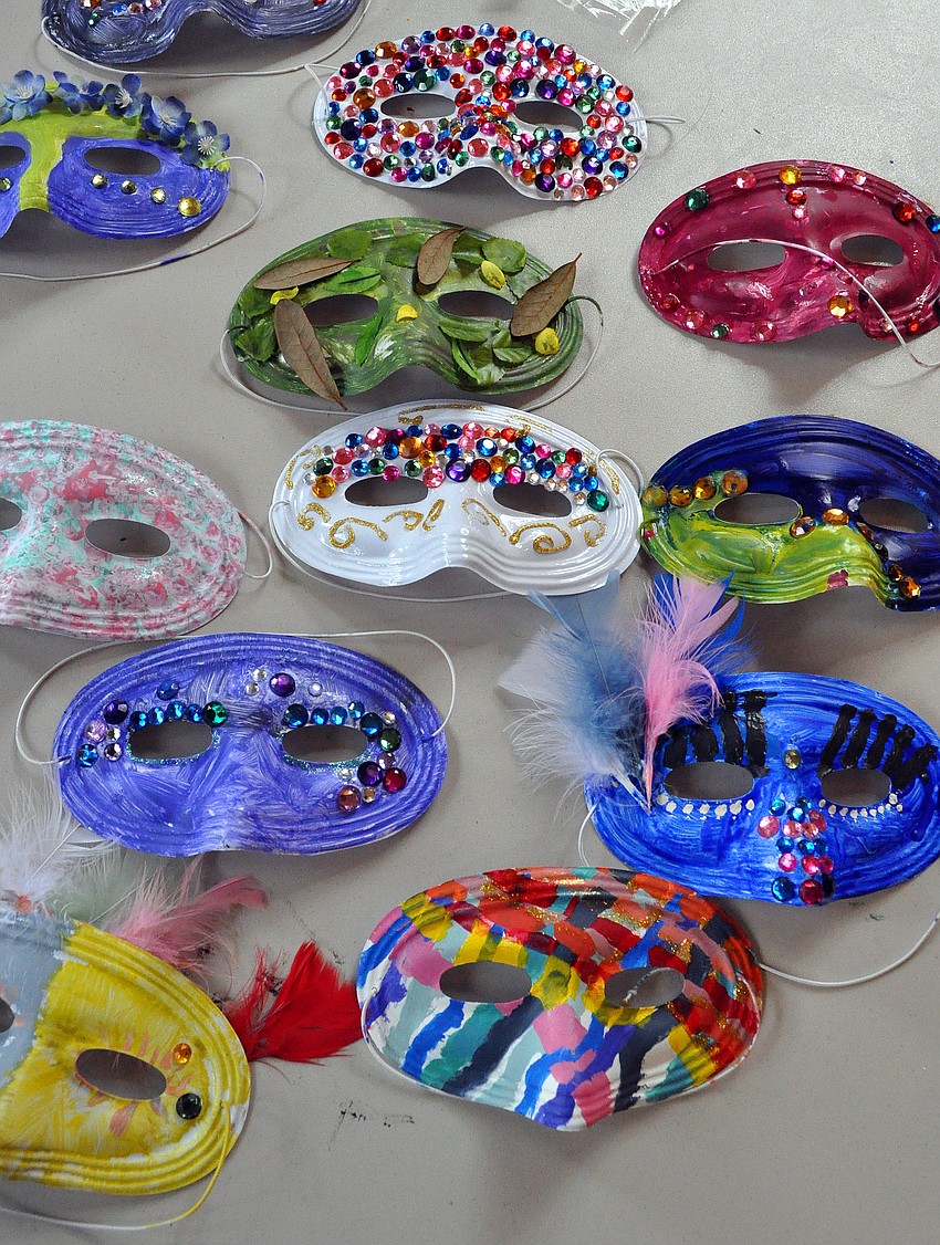 Finished masks were put onto a table to dry.