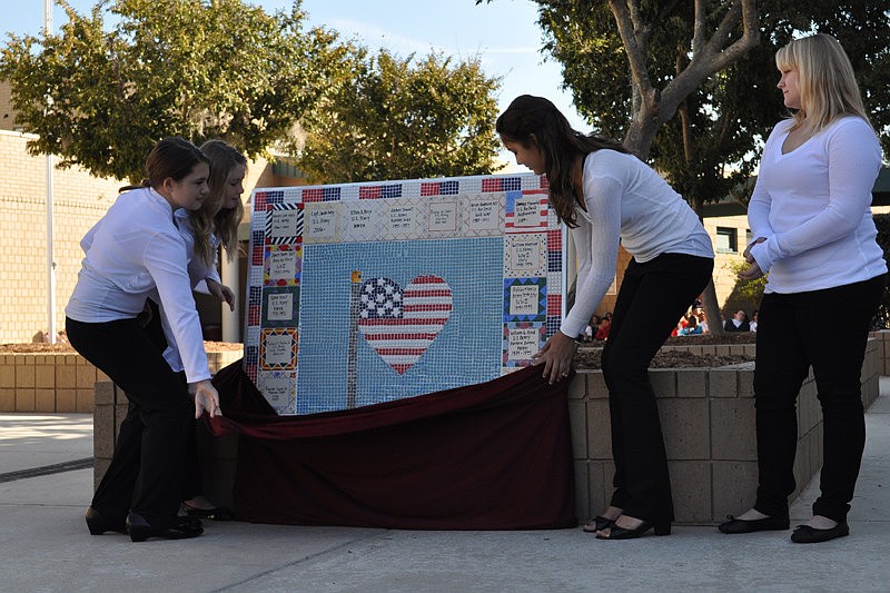 Students unveiled the 24th panel for the school's Wall of Honor.