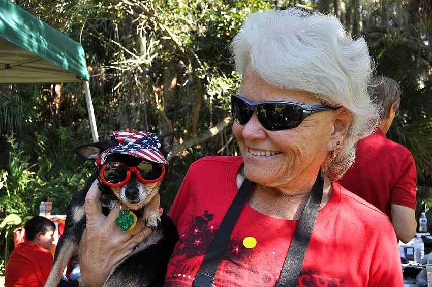 Candy Gore poses with her dressed-up pup, Annie, 9.