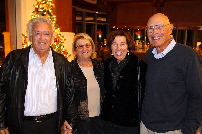 Rich and Nancy Sartori pose with Fran Harris and Al Tripodi, Thursday, Dec. 8 at the Observer Cup Challenge Cocktail Party at the Sarasota Yacht Club.