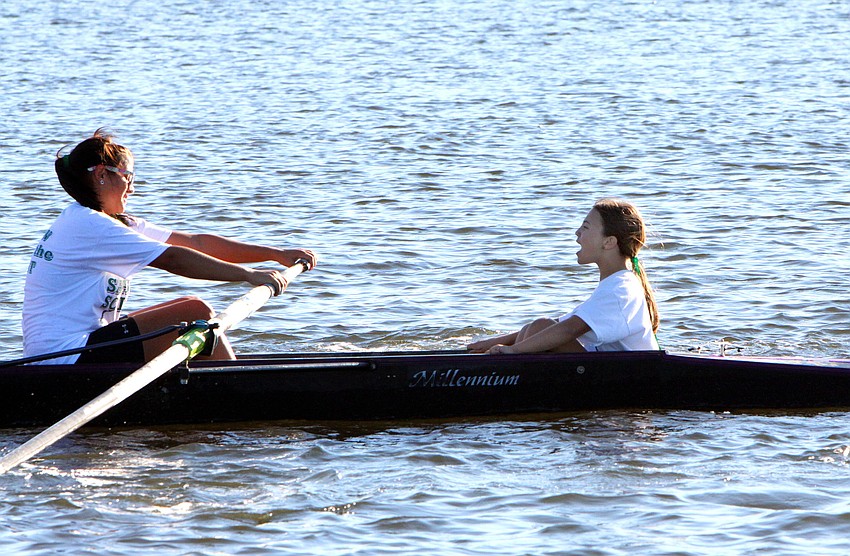 Sarasota Scullers Coxswain Naidel calls out to her team to work harder and keep going during the Sarasota 5000 Regatta out at Blackburn Point Park.