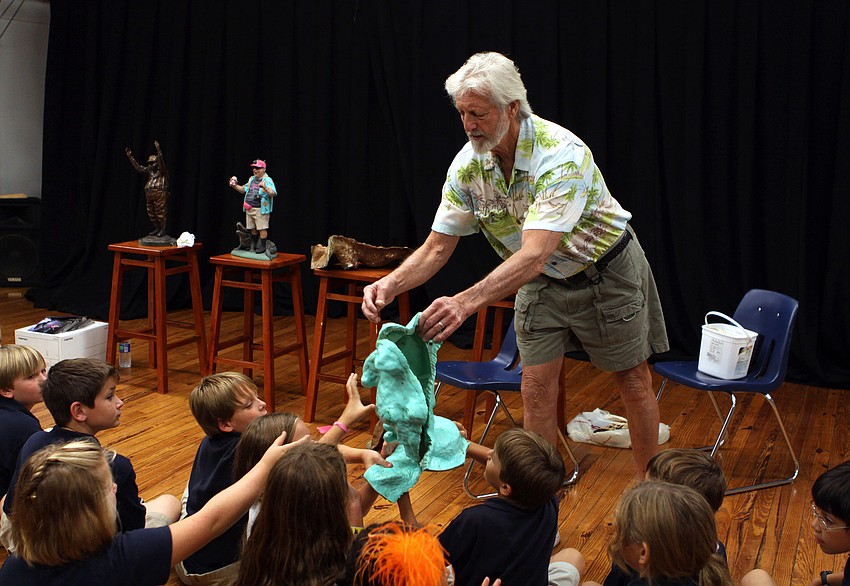 Jack Dowd holds out the rubbery mold of 