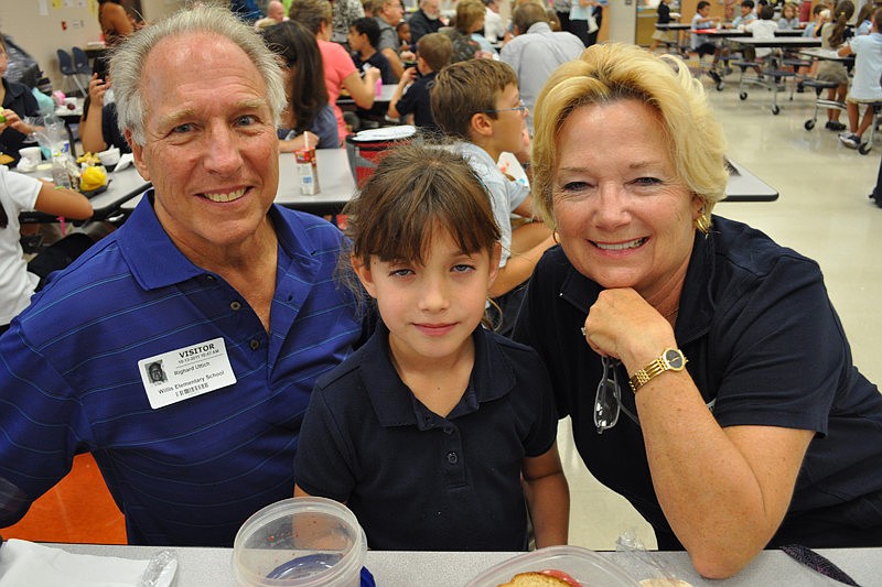 Richard and Roberta Uttich with their granddaughter, Julia Reed, center.