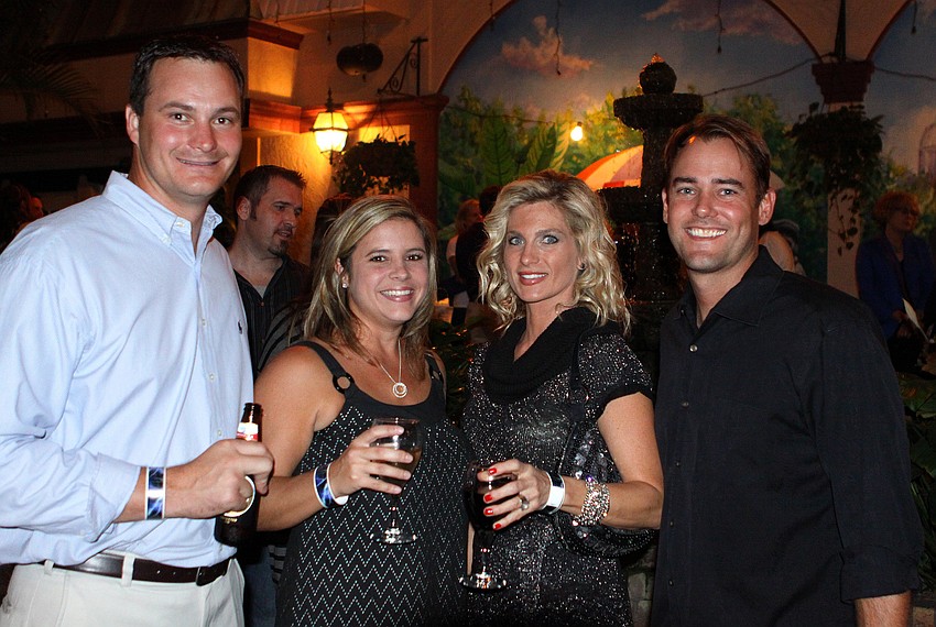 Matt and Rebecca Marsters pose with Ann Piper and Jason Moxley