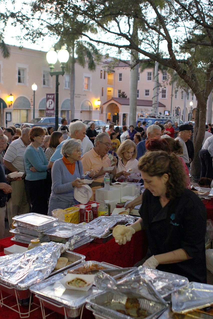 People waited in line for long periods of time in order to get food at A Taste of Chanukah, Tuesday, Dec. 20 at Five Points Park.