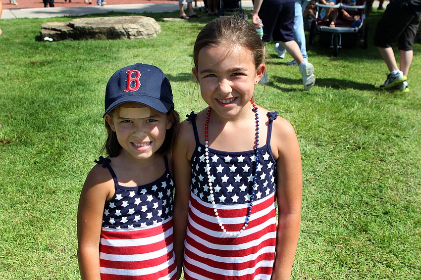 Helena Dunham, 5, and Haley, 8, wore matching dresses Sunday, Sept. 11 for the Remembrance March and Celebration. Their father is local firefighter Tony Dunham.