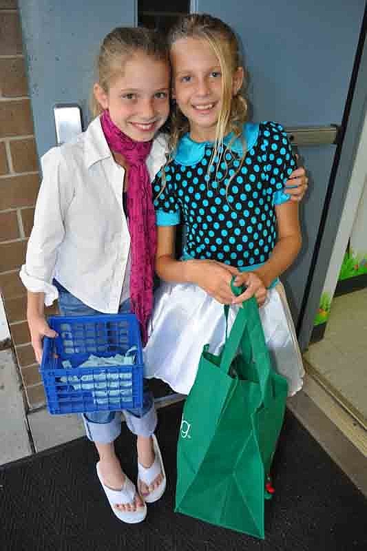 Rachel Weronik and Hayden Gregan collected tickets as guests arrived.