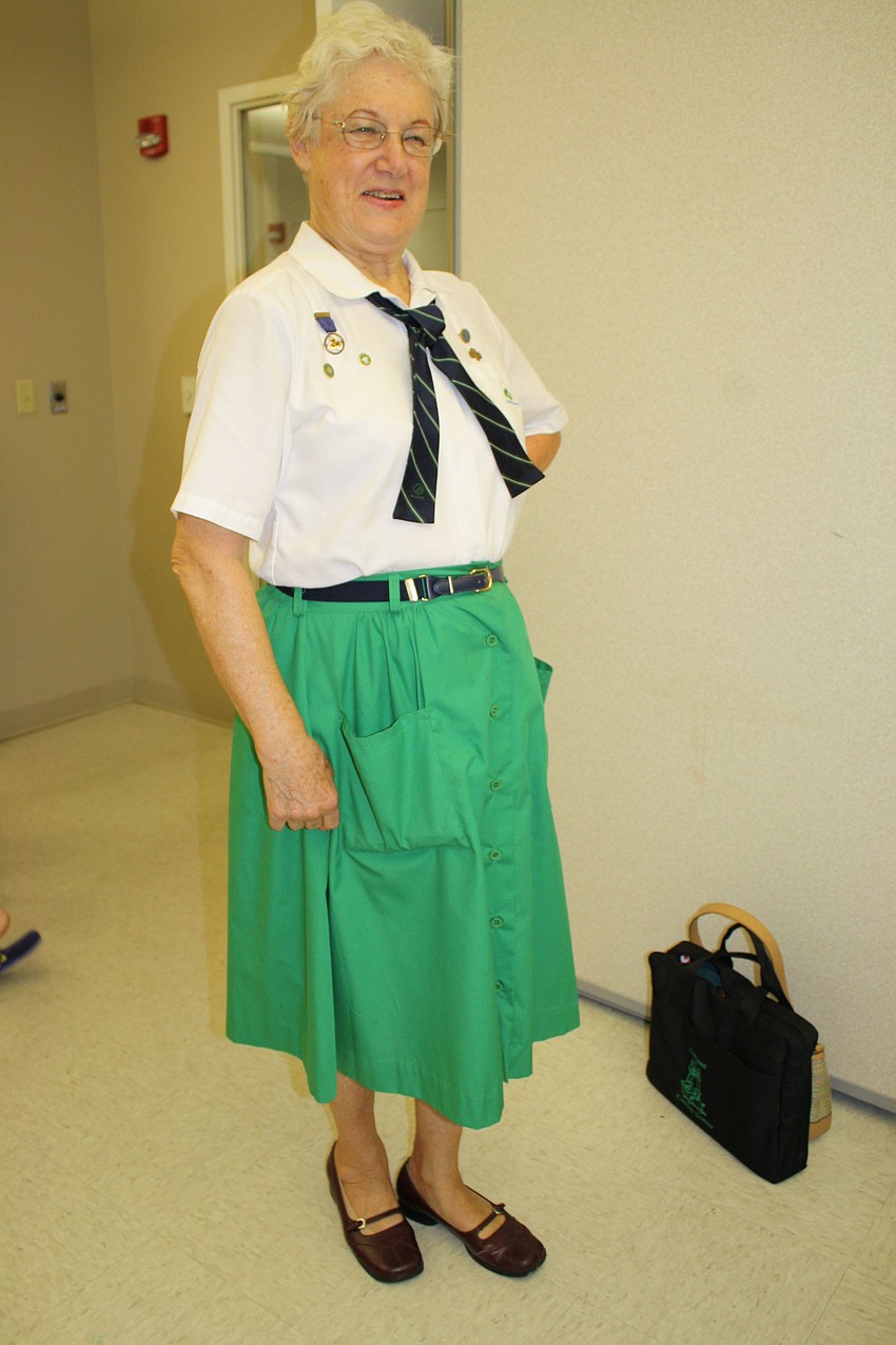 Erika Thiringer has been an active Girl Scout since 1968. This uniform is from the â€˜80s and 90s.
