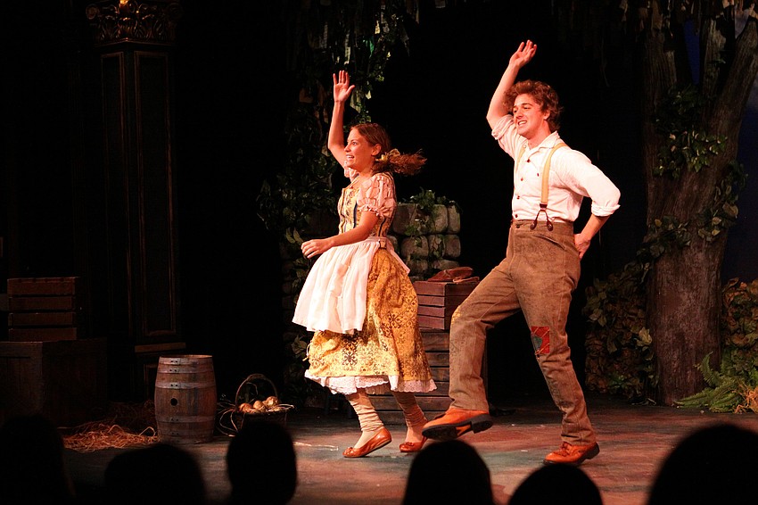 Roisin, Sarah DeStefano, and Jack, A.A. â€œCorbinâ€ Puryear, do a little dance during Florida Studio Theatreâ€™s â€œJack and the Enchanted Beanstalkâ€ Tuesday, Sept. 27 at the Gompertz Theatre.